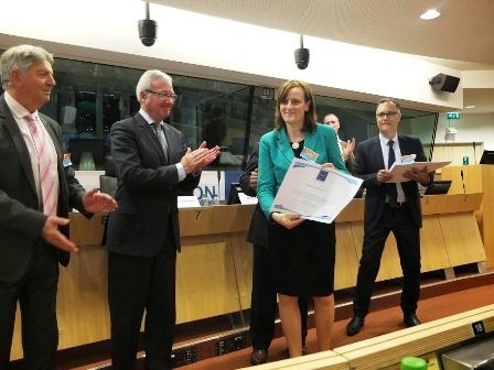 Maria Ferguson accepting Certificate
